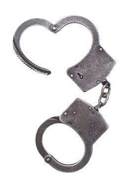 Metal handcuffs for hands on a white background clipart