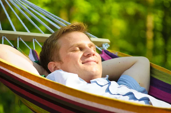 Young man sleeping in a hammock Royalty Free Stock Images