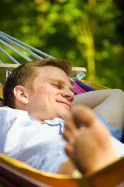Young man sleeping in a hammock — Stock Photo, Image