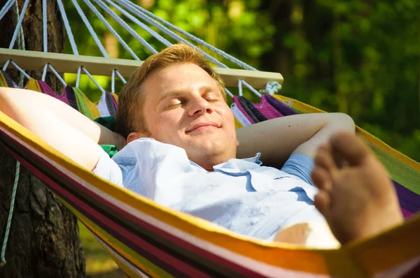 Young man sleeping in a hammock Stock Image
