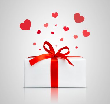 Present box with red ribbon. clipart