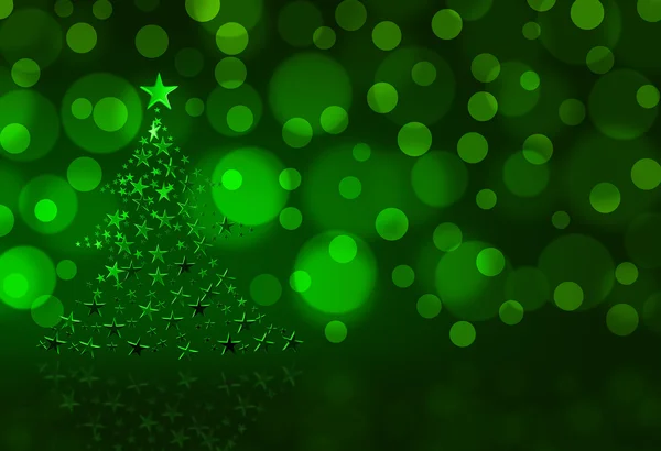 Kerstboom op groen — Stockfoto