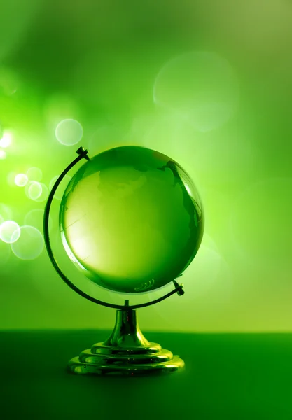 Зеленого скла глобус — стокове фото