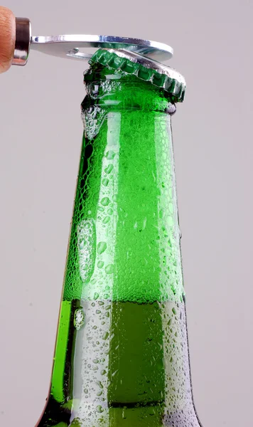 Beer bottle being opened — Stock Photo, Image