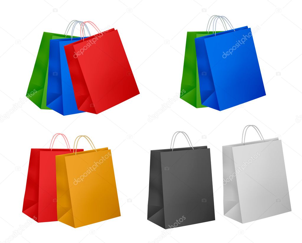 Ssorted colored shopping bags including red, yellow, blue and pink on a whi