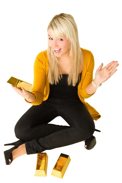 Young happy girl with goldbars — Stock Photo, Image