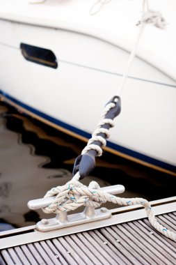 Mooring at a marina clipart