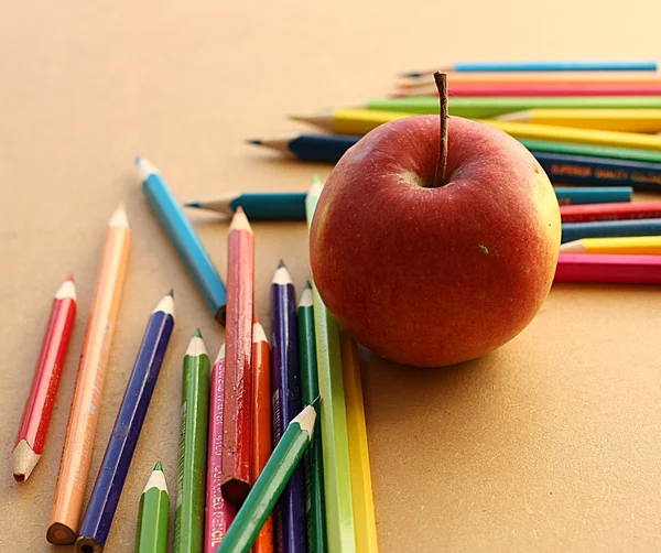Color pencils with apple — Stock Photo, Image