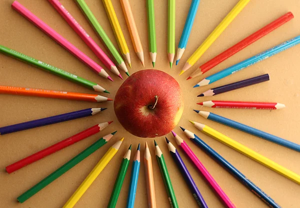 Color pencils with apple — Stock Photo, Image