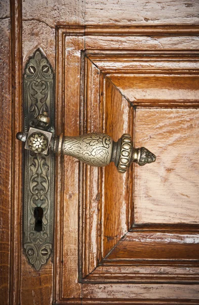 stock image Retro styled door handle and wooden door