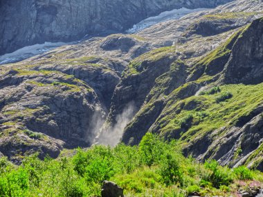 Caucasus waterfall. Dombay. Sufrudju. clipart