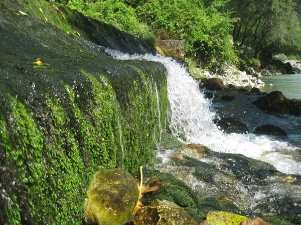 Low and wide waterfall. Abhazia travel — Stock Photo, Image