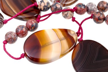 Fragment agate lady's bead closeup clipart