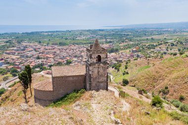 Medieval chapel and view on seacoast clipart