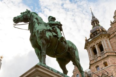 Bronze statue of Freden Roskilde near Nordic Museum, Stockholm clipart