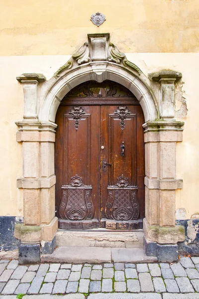 Old door on street in old town — Stock Photo, Image