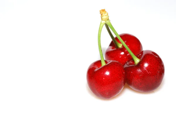 Tre ciliegie rosse — Foto Stock