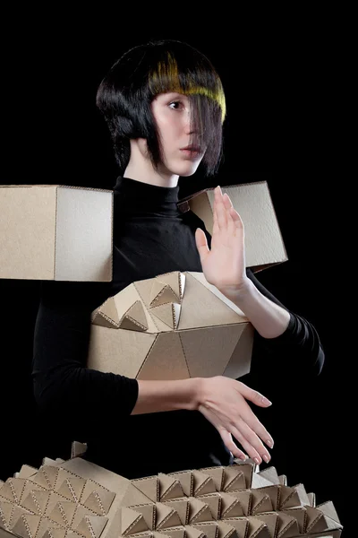 Doll in cardboard dress — Stock Photo, Image