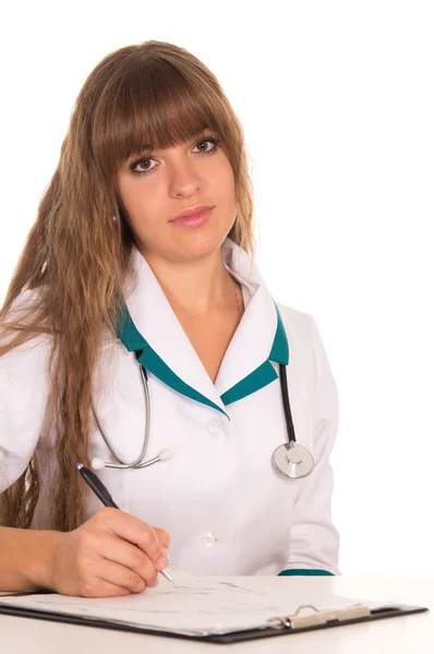 Słodkie pielęgniarka w tabeli — Zdjęcie stockowe
