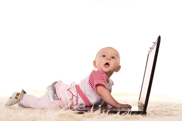 Little baby and laptop — Stock Photo, Image