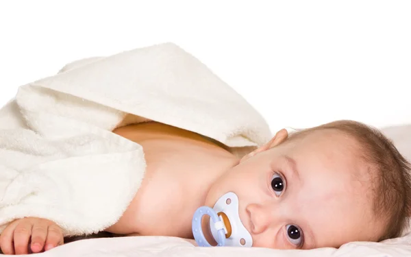 Baby with a teat — Stock Photo, Image