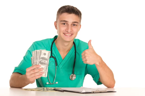 年轻的医生用的钱 — 图库照片