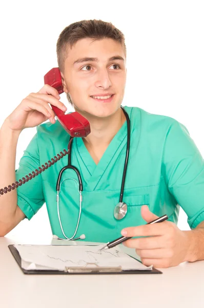 Trevlig läkare med telefon — Stockfoto