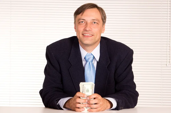 Empresário inteligente com dinheiro — Fotografia de Stock