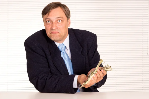 Slimme zakenman met geld — Stockfoto