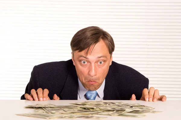 Hombre de negocios afortunado con dinero —  Fotos de Stock