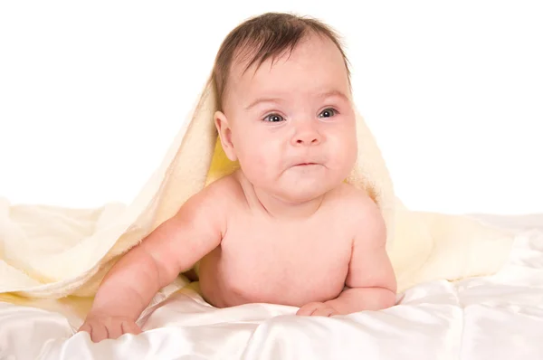 Baby under towel — Stock Photo, Image