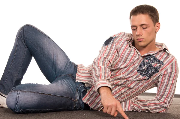 Chytrý chlap ležící — Stock fotografie