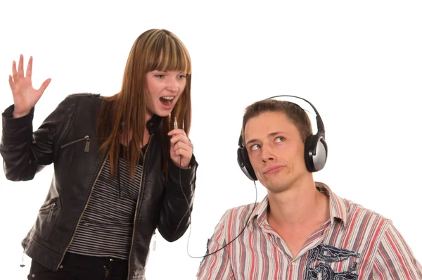 Menina e menino com fones de ouvido — Fotografia de Stock