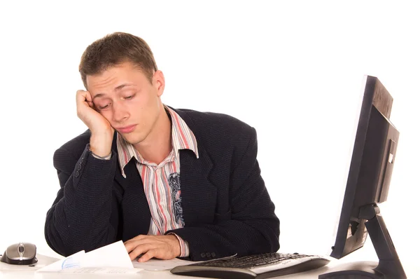 Trabajador joven en la mesa — Foto de Stock