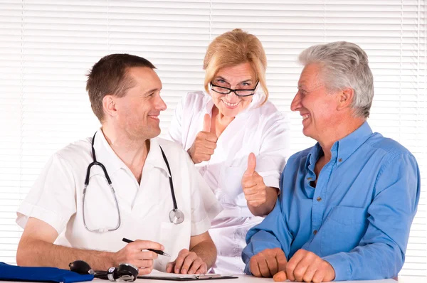 Trzech lekarzy na biały — Zdjęcie stockowe