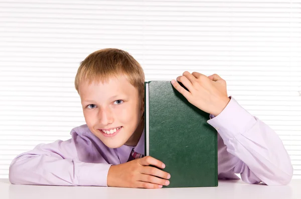 Pupil with book — Stock Photo, Image