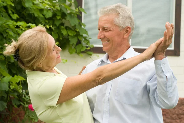Nice elderly couple dancing — Stock Photo, Image