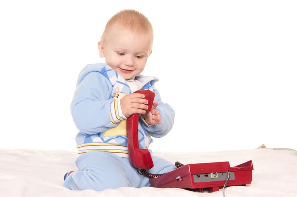 Criança pequena com telefone — Fotografia de Stock