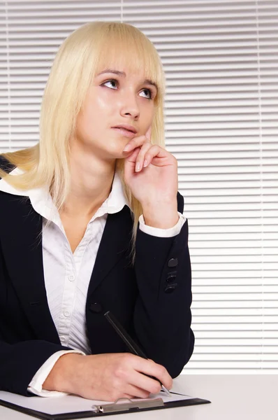 Pretty young woman at office — Stock Photo, Image