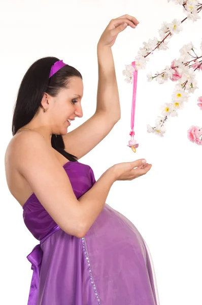 Těhotná žena v šatech — Stock fotografie