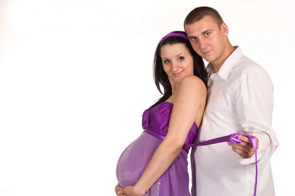 Άνθρωπος με την έγκυο γυναίκα — Φωτογραφία Αρχείου