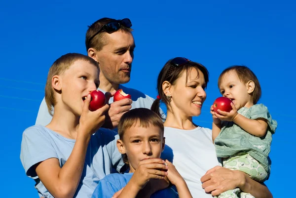 Family apples eating — Stock Photo, Image