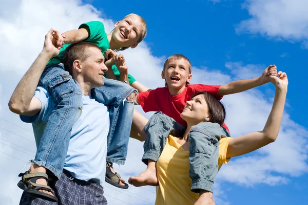 Family and sky — Stock Photo, Image