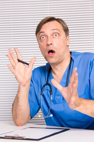 Cute doctor sitting — Stock Photo, Image