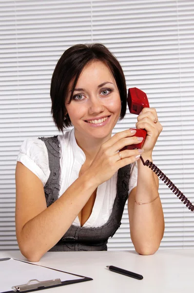 Menina adulta com telefone — Fotografia de Stock