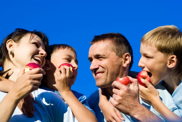 Family and apples — Stock Photo, Image