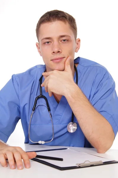 Doctor at table — Stock Photo, Image