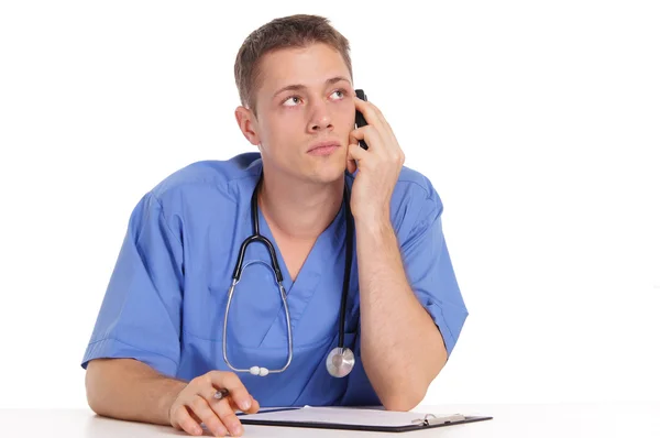 Läkare och telefon — Stockfoto