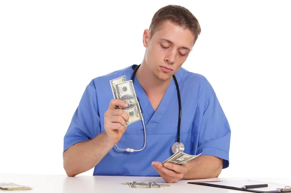 Orvos és készpénz — Stock Fotó
