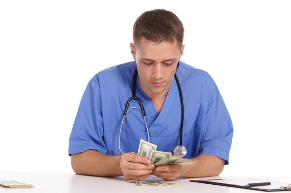 Läkare och kontanter — Stockfoto